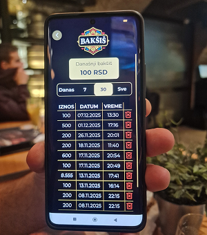phone on site showing last transactions on app
